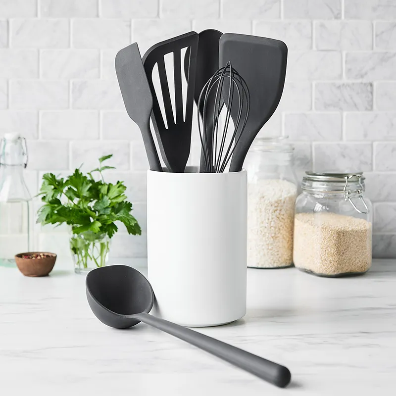 Silicone kitchen utensils including spatulas, whisk and ladle