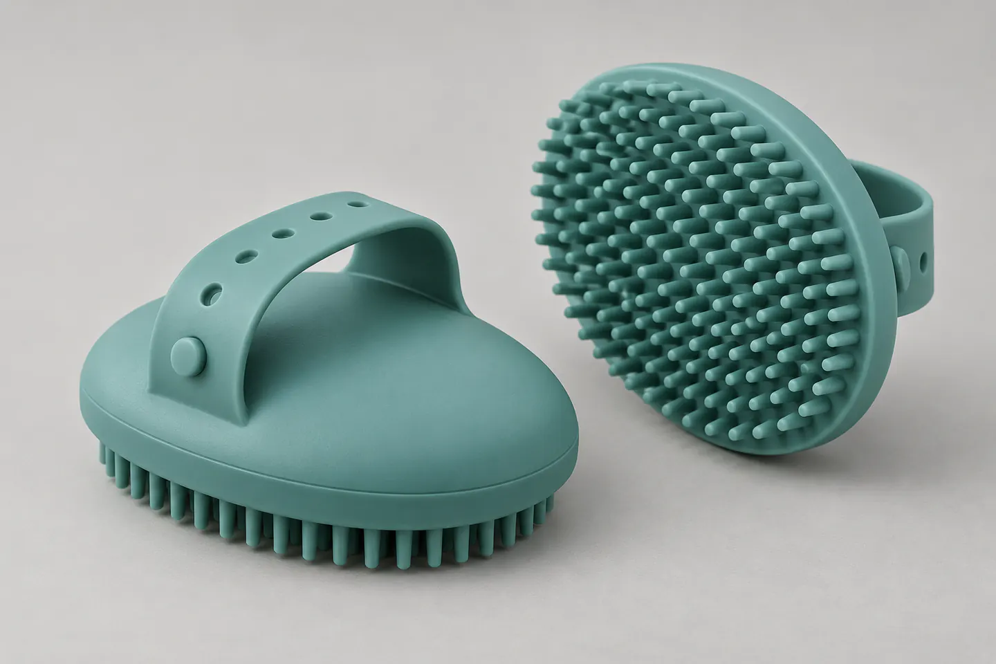 Custom oval silicone pet grooming and bath brush with adjustable palm strap and flexible bristles